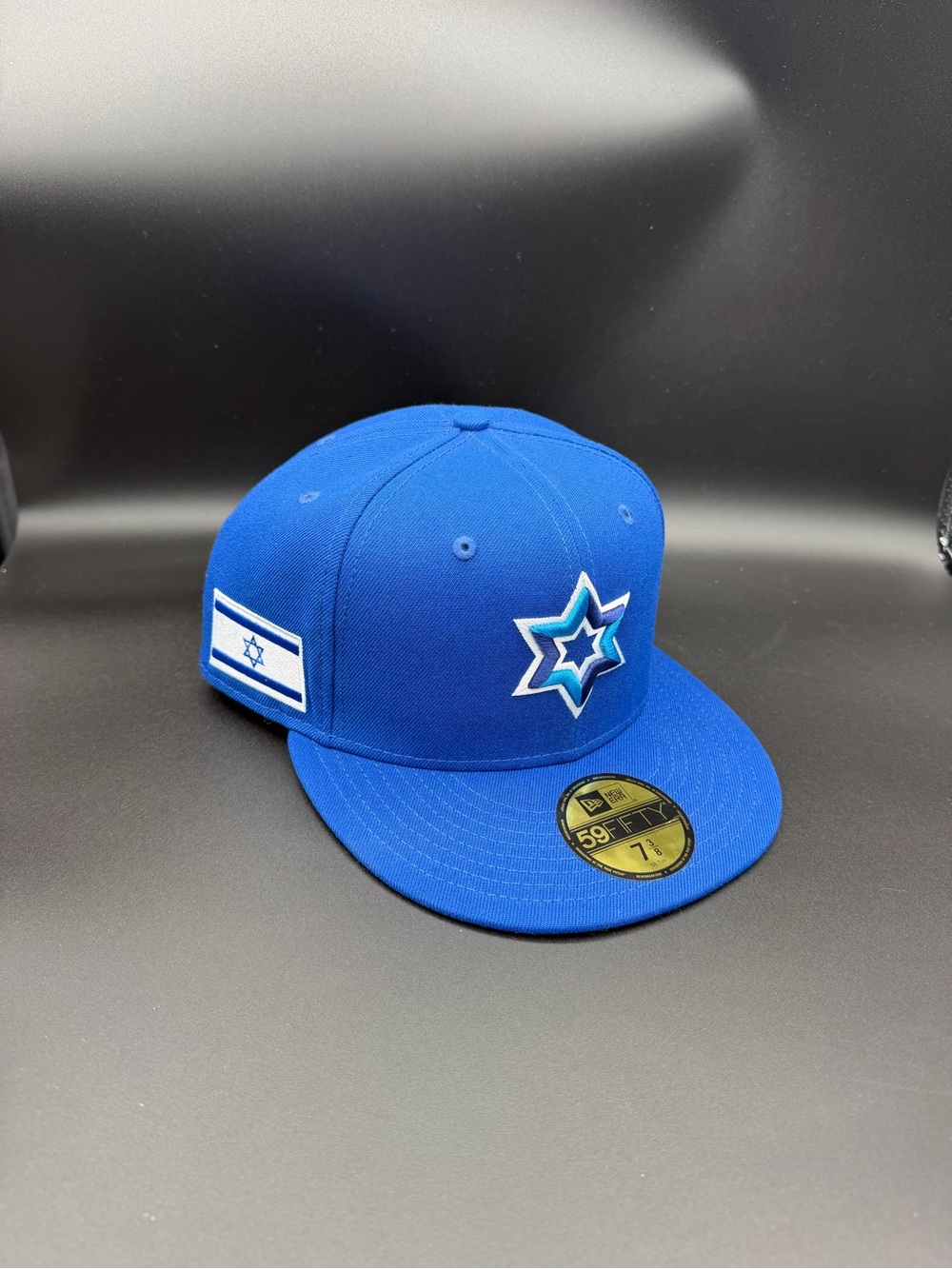 New Era Blue Fitted Cap with Star Emblem and Flag Patch